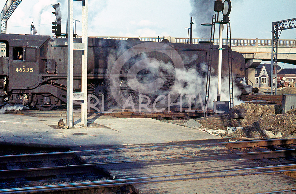 46235 City of Birmingham in terrible external condition at Bletchley station June 1964 SRL No 233