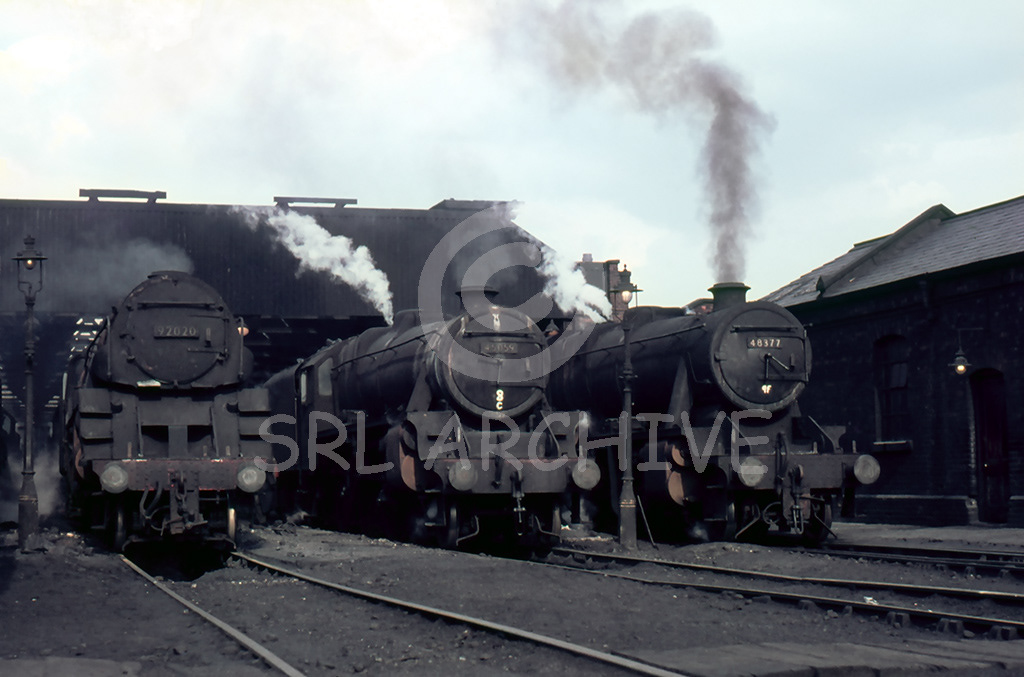 48377 along side Franco-Crosti 9F 92020, Class 5 45059 on shed at Heaton Mersey 1966-67 SRL No 1034 