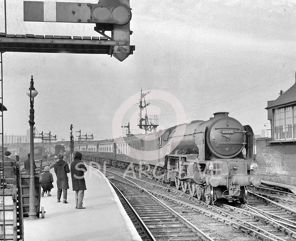 60145 'St Mungo' entering Peterborough North station with some young spotters catching the number Saturday 10th February 1962 Les Perrin/SRL No 760