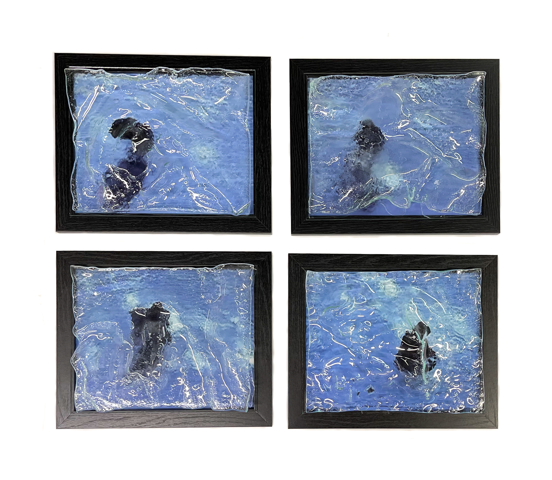 "Dissolution in Four Parts," photography with sandcarved glass