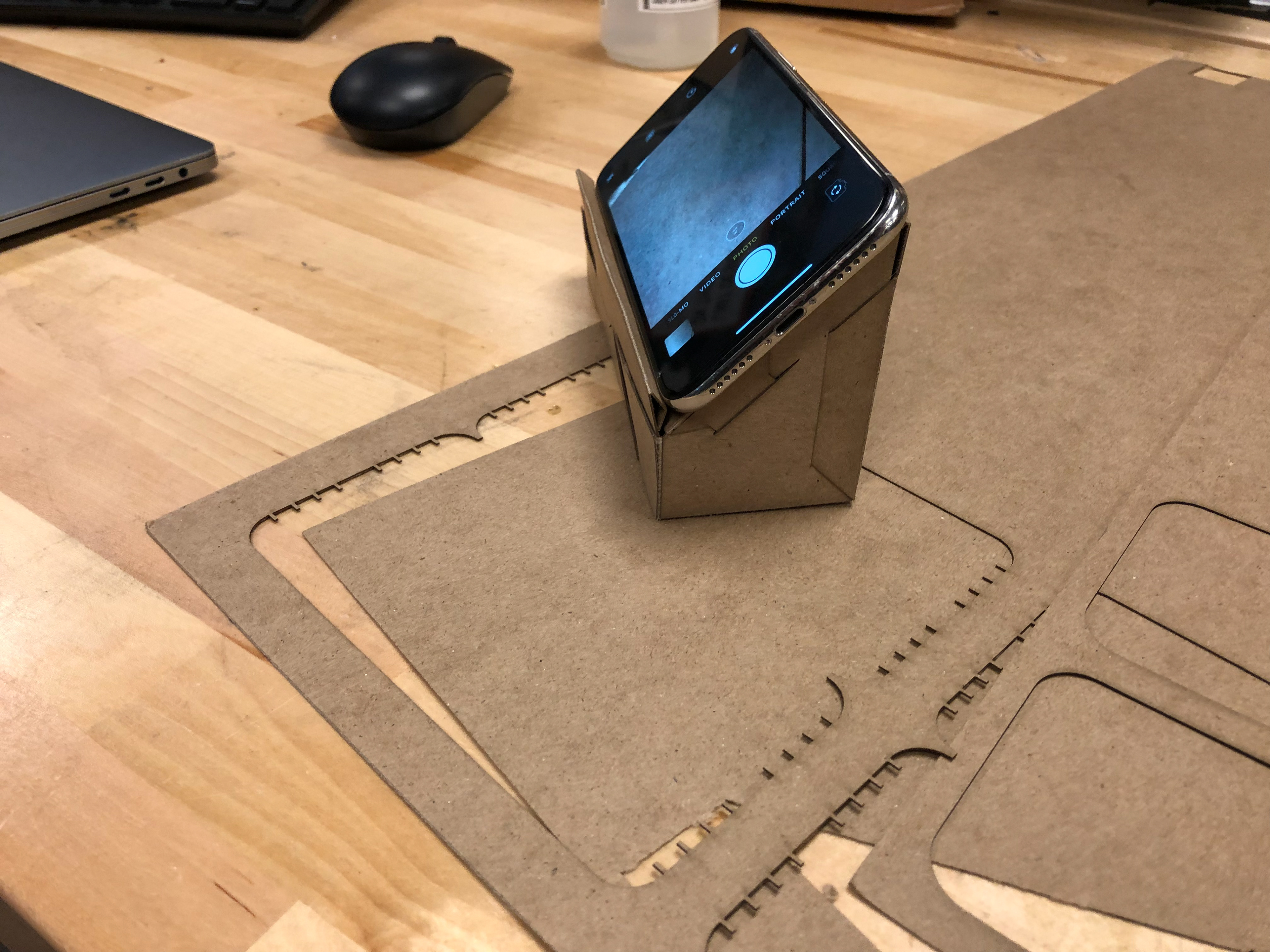 Side view of the prototype with an iPhone X being tested