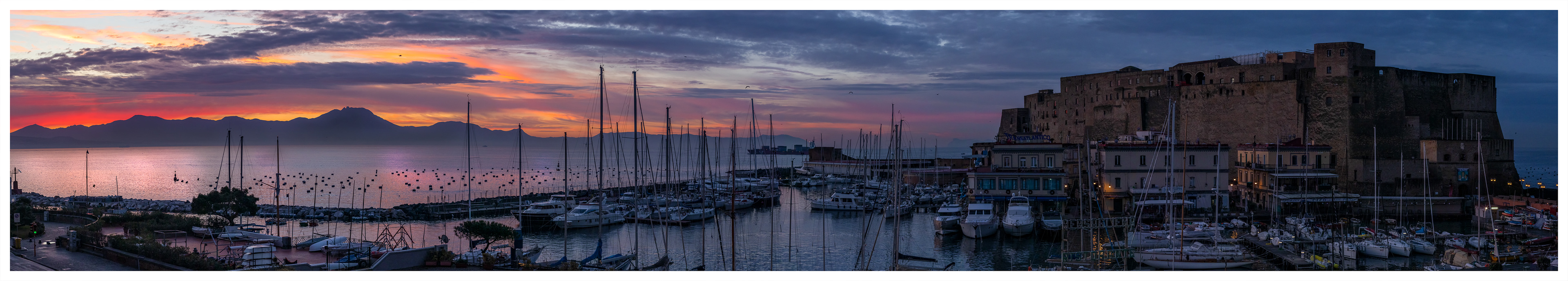 Sunrise across Castel dell'Ovo and the bay of Napoli