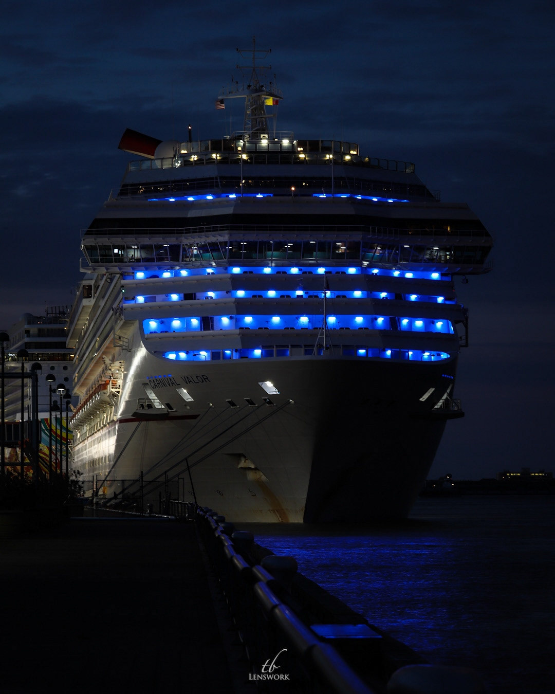 The bow of the Carnival Valor lit blue as part of the “Light it Blue” campaign to honor front line workers during the COVID-19 pandemic.