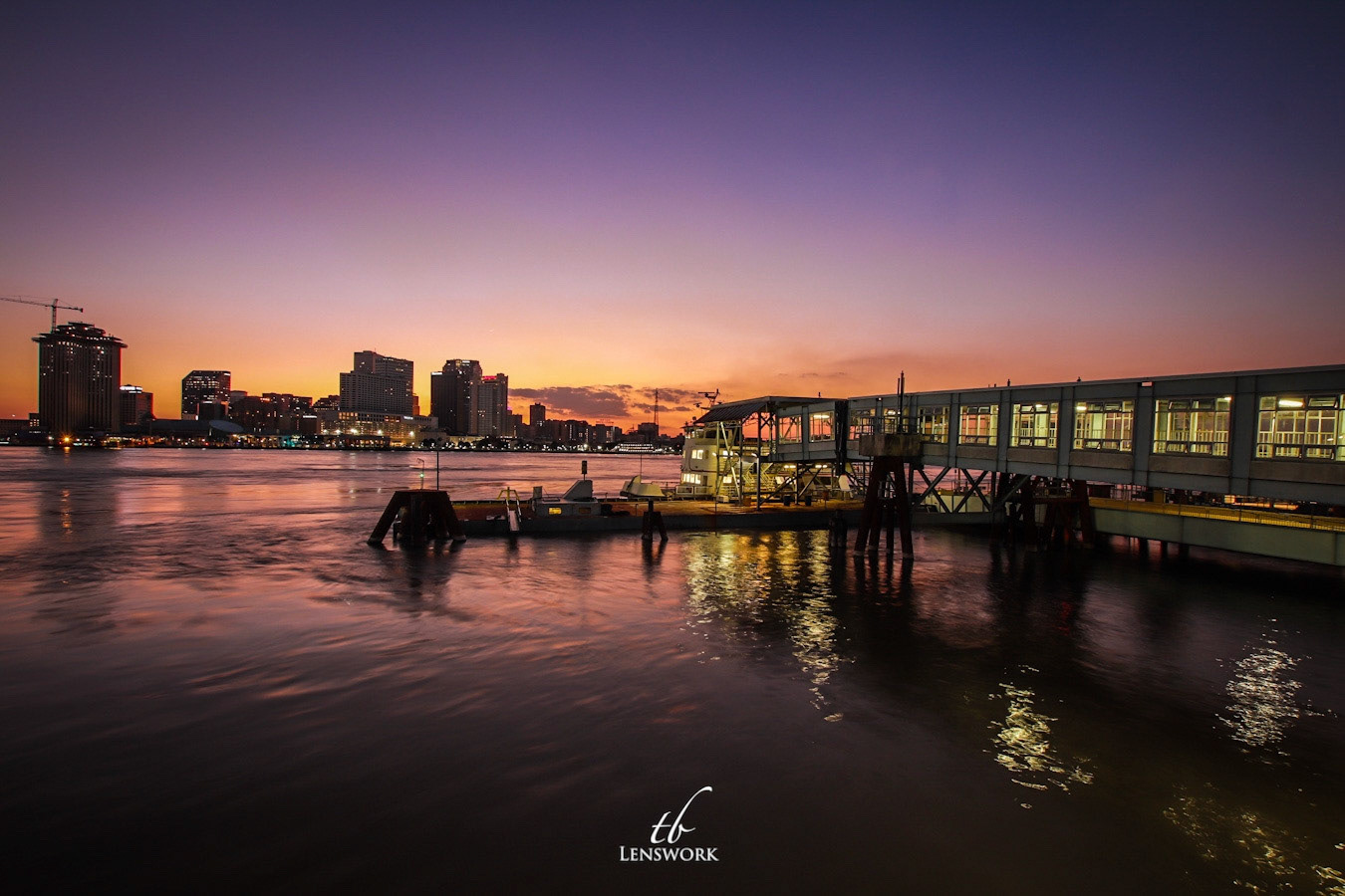 Usually full of people and life, the Algiers Ferry just sits in the calm waters of the Mississippi River.
