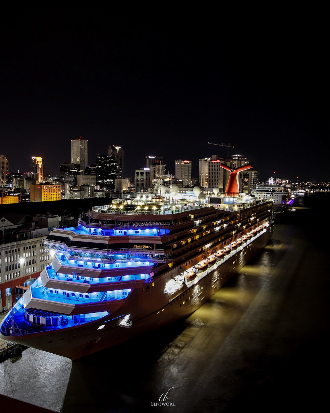 The bow of the Carnival Valor lit blue as part of the “Light it Blue” campaign to honor front line workers during the COVID-19 pandemic.