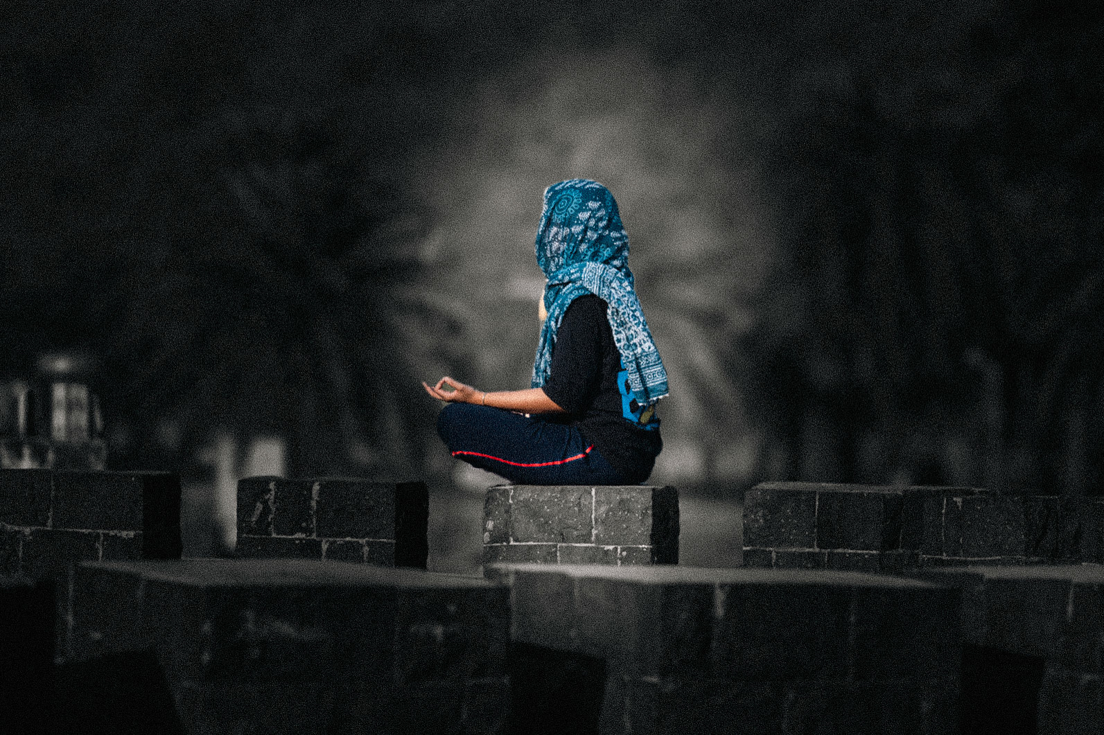 Woman doing yoga on Lake Upwan