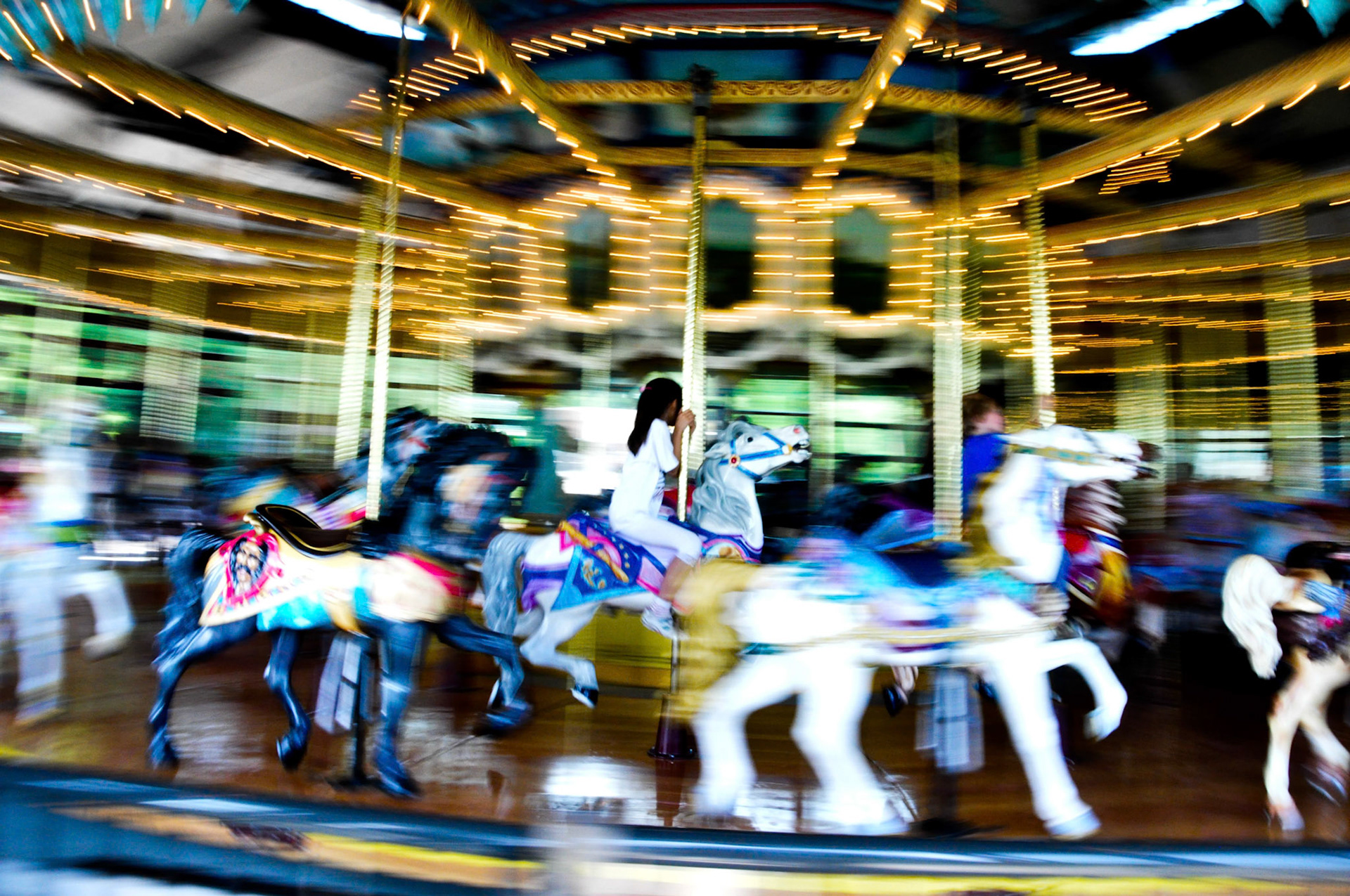 Girl on merry-go-round