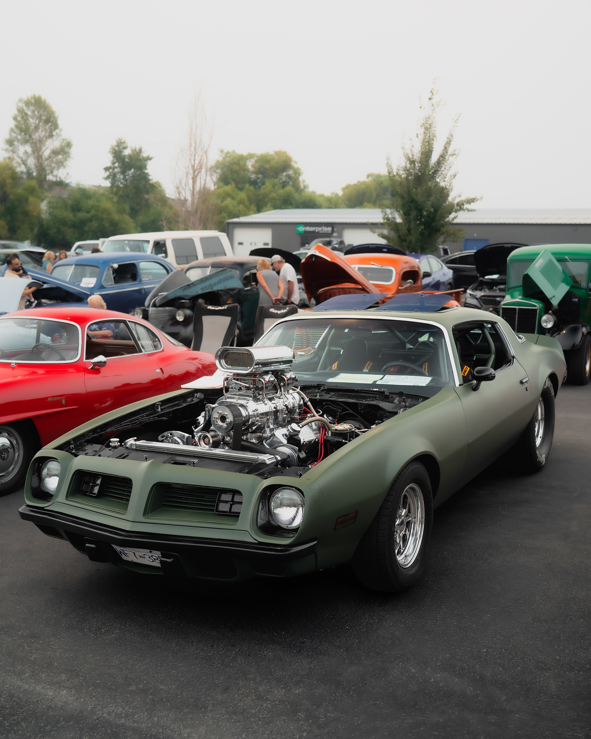 Modified Pontiac captured during automotive event coverage.