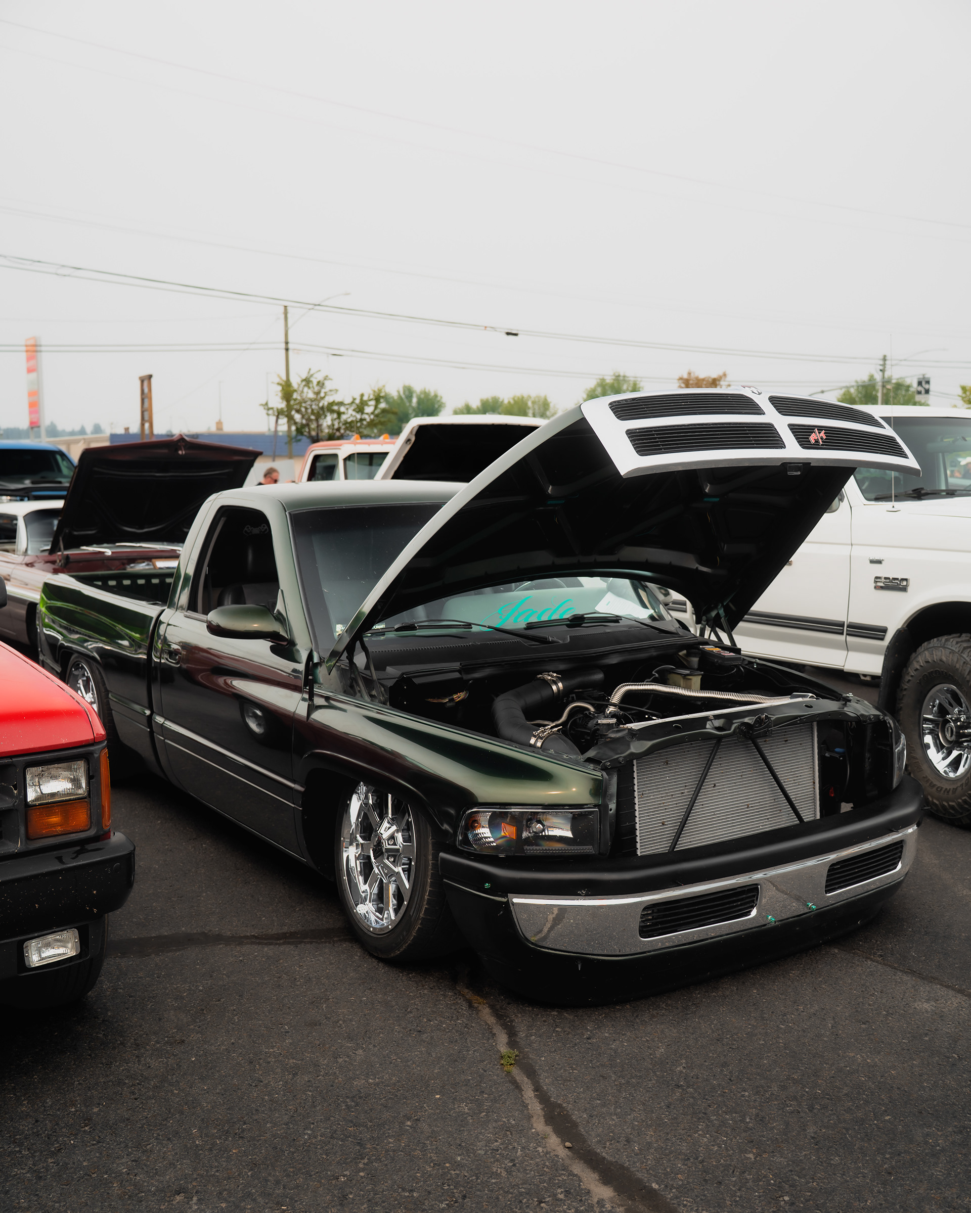 Custom Dodge pickup captured during automotive event coverage.