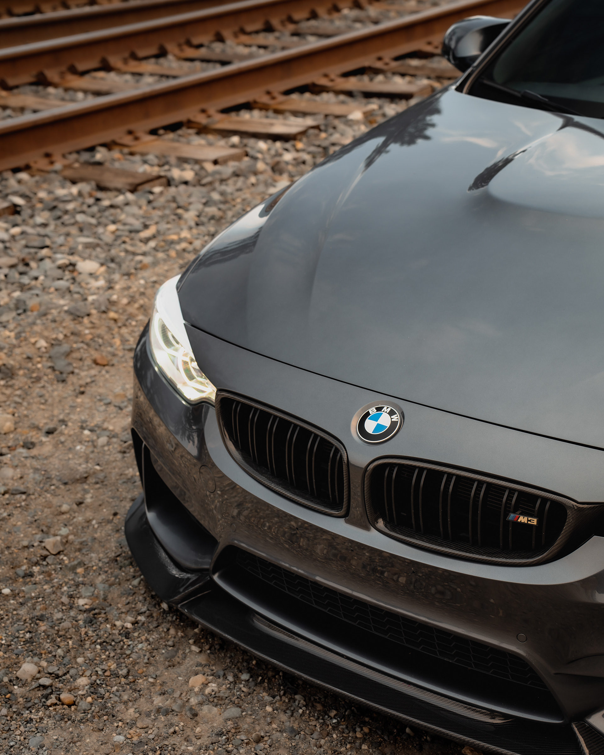 Detail-focused angle emphasizing the front-end design, reflections, and bodywork.