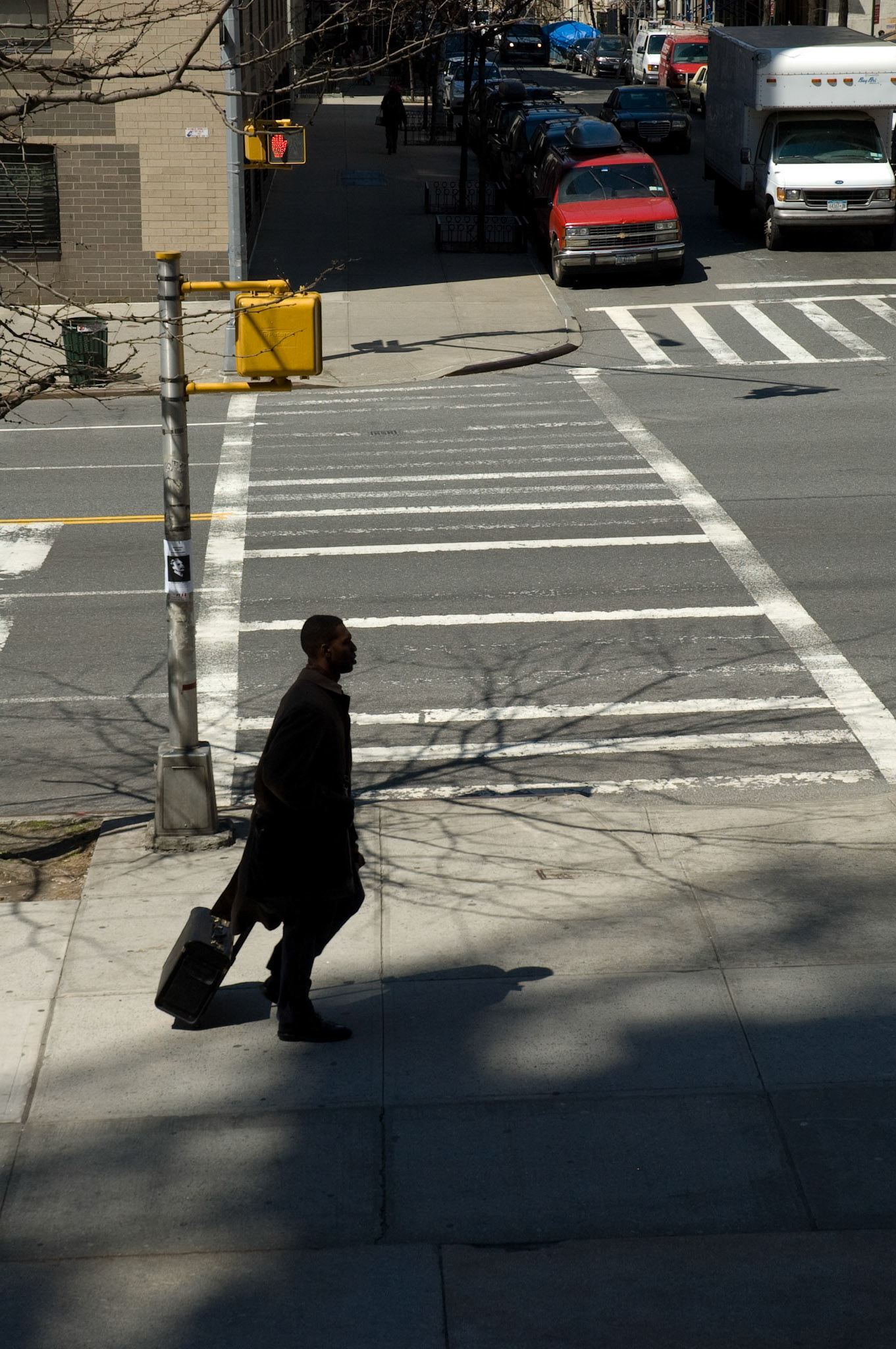 Traveller and crossing, Amsterdam Avenue, New York, April 2007