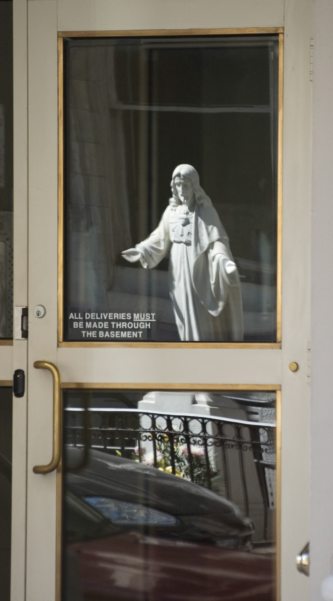 Reflection of Christ statue, New York, April 2007
