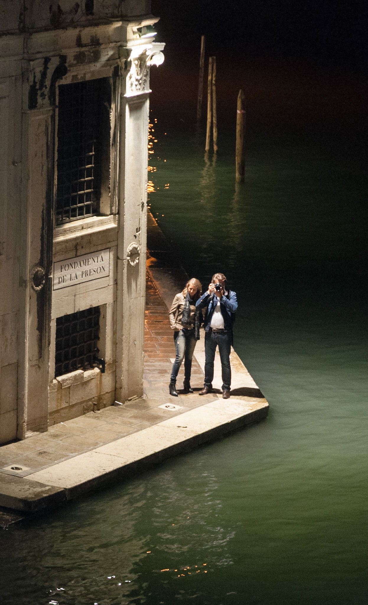 Photographer at night, Venice, 2014