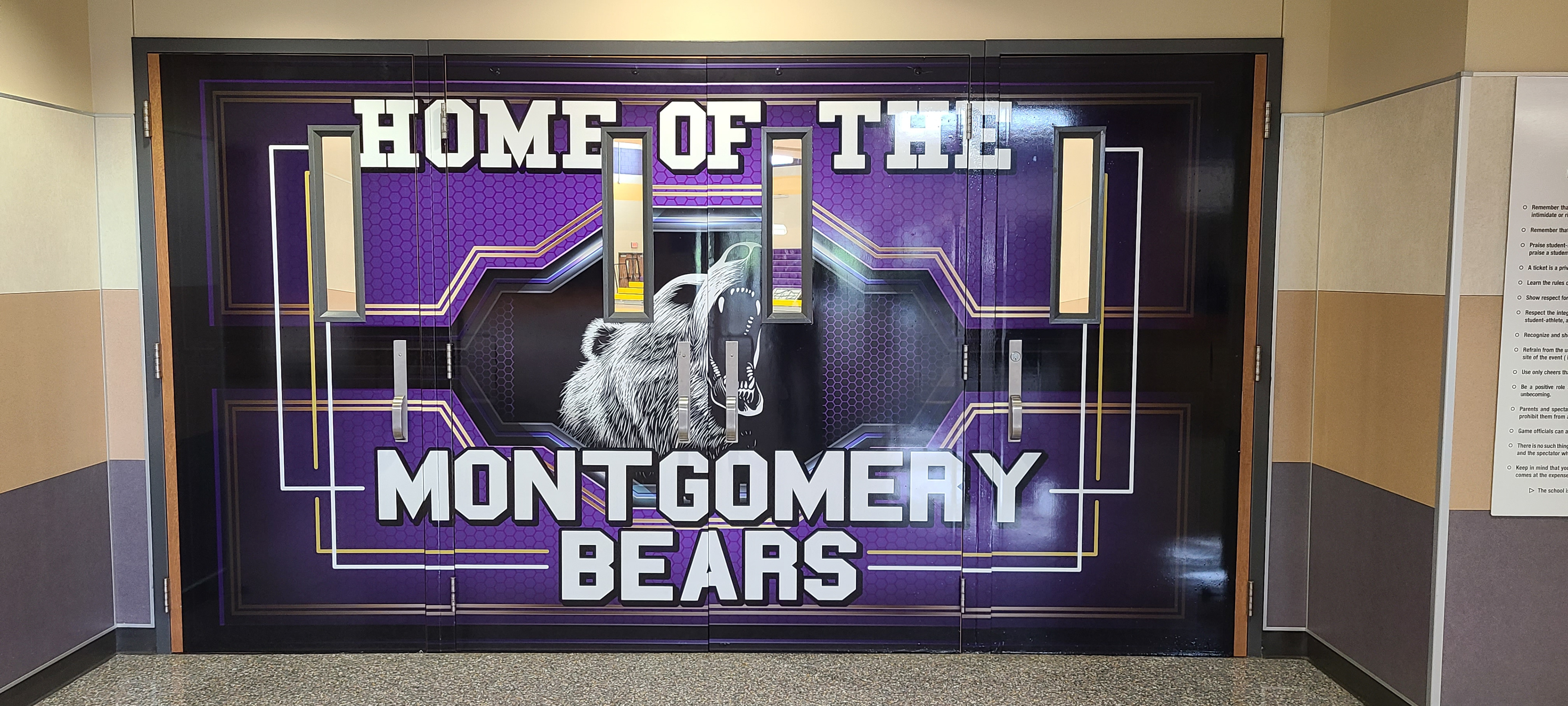 Vinyl door coverings for the entrance to the main gym