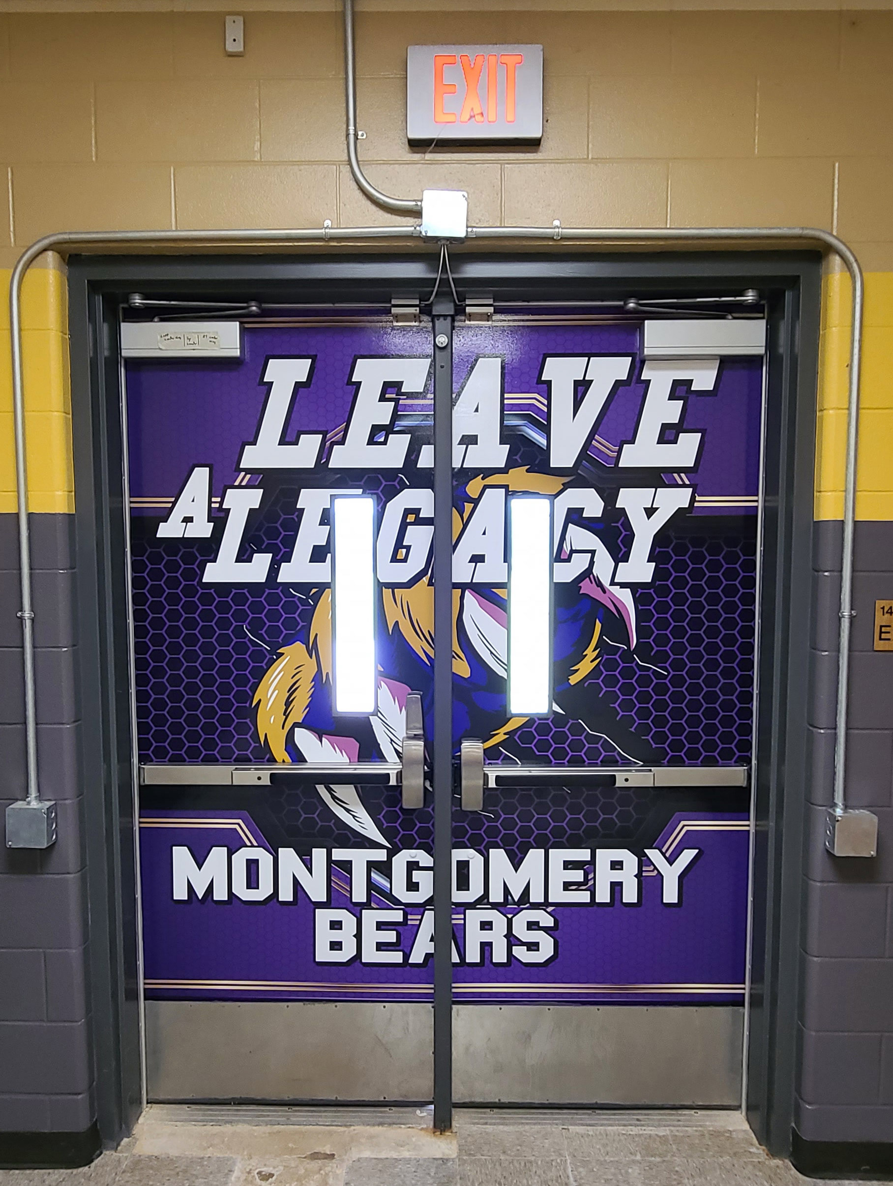 Vinyl door coverings for the athletic hall's exit