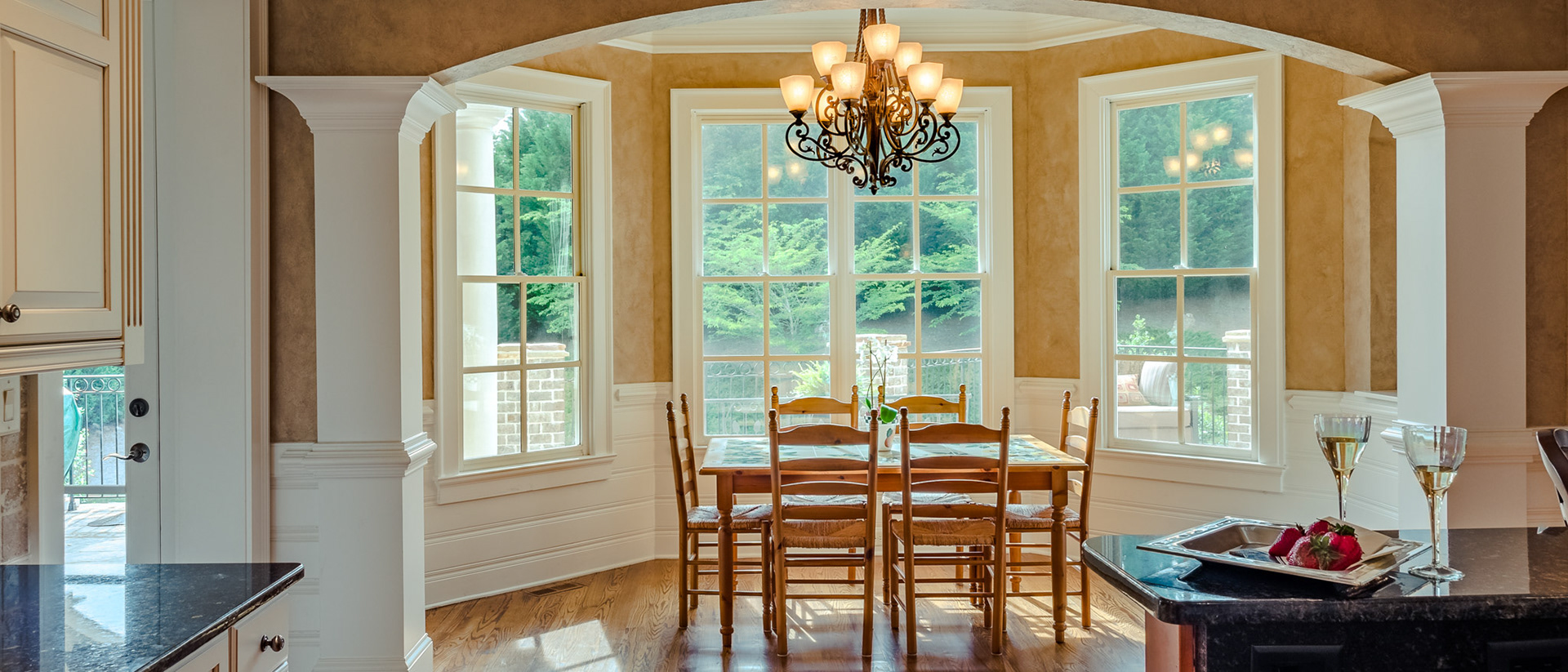 Breakfast room and luxury lifestyle staging in home photographed by Cindy Kringelis of Alpharetta Photography, LLC.