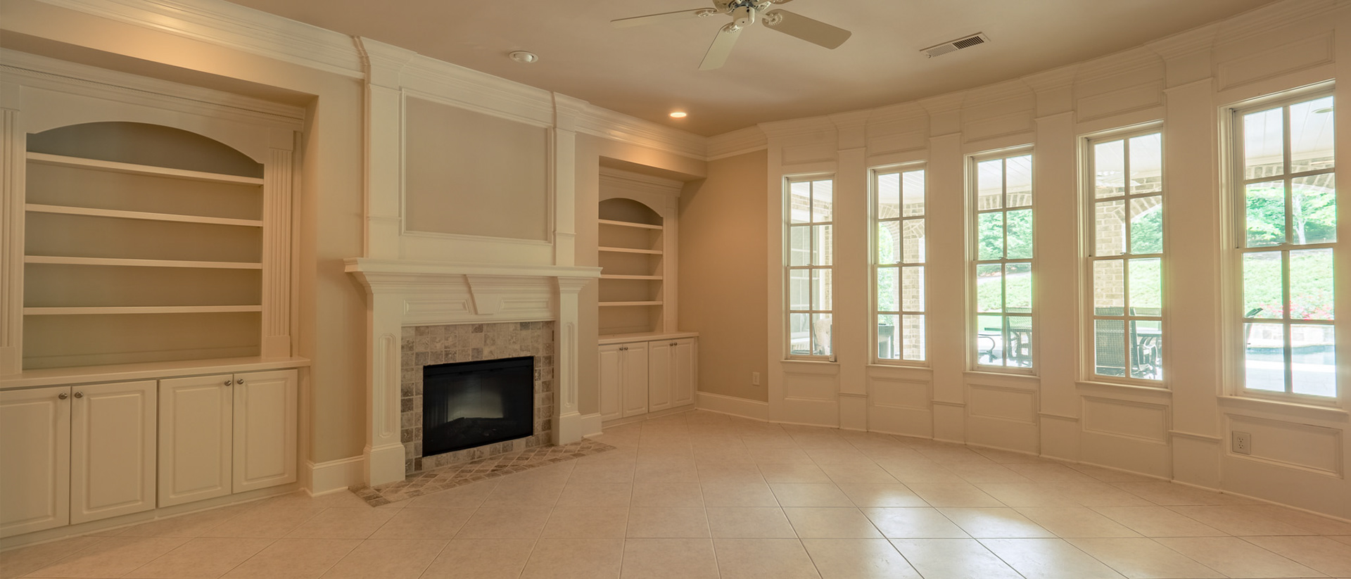 Secondary living space in the terrace level, overlooking pool of 110 Manor Lake Court in Milton, GA.