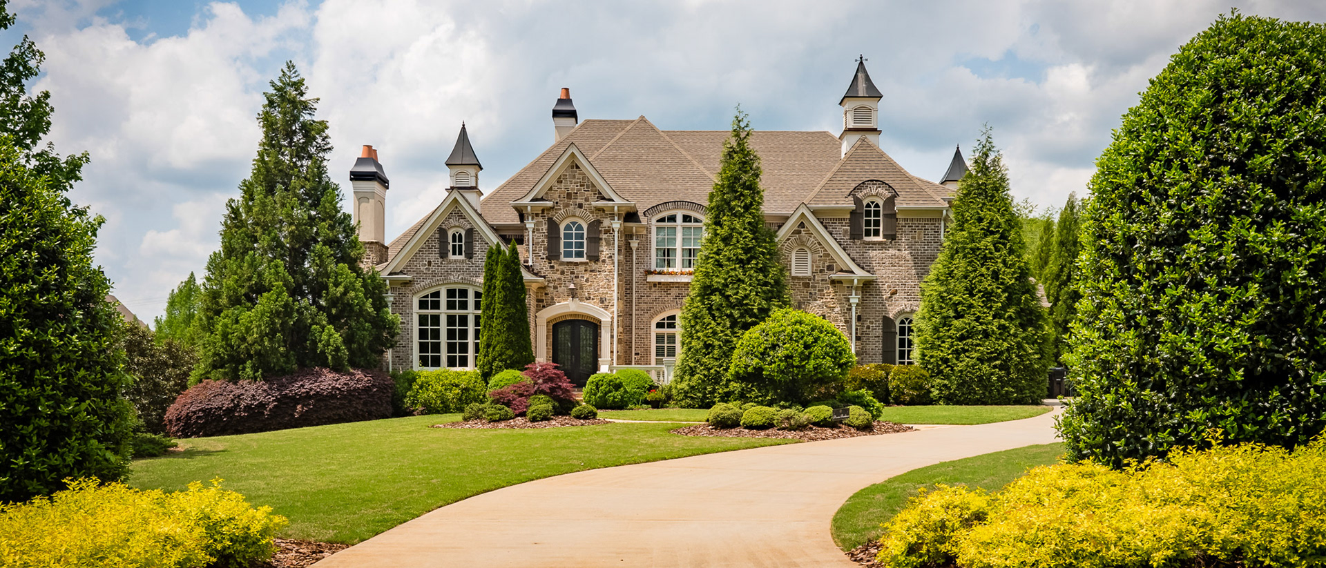 Jack-Webb Chateau located at 110 Manor Lake Court in The Manor Golf and Country Club in Milton, GA.