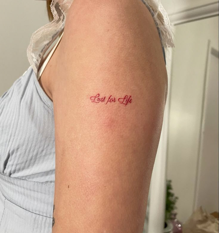 Photo revealing my Lana Del Rey inspired tattoo, accumulating 18.5k impressions and 798 interactions.