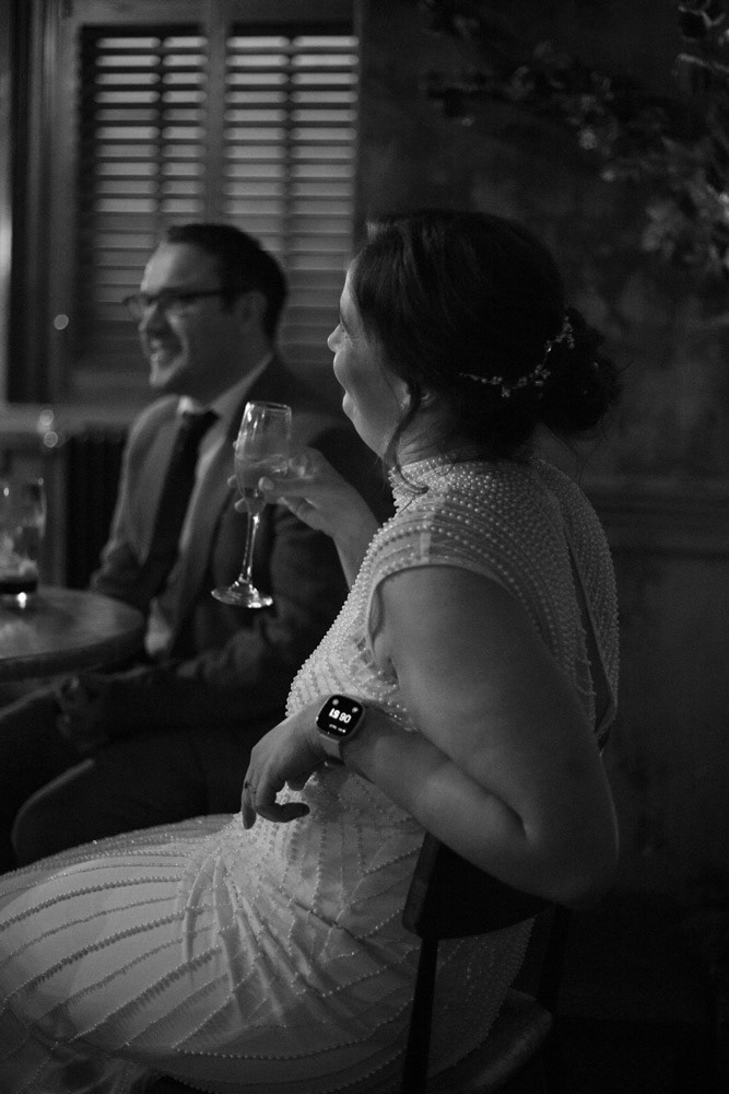 Gemma shows the time on her smartwatch at the reception