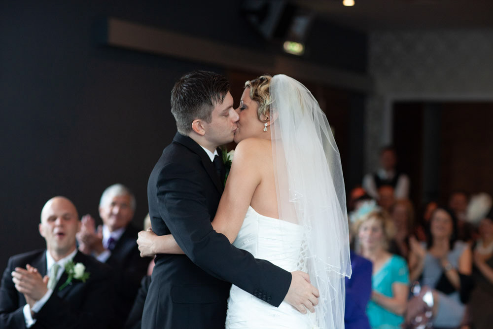 The couple share their first kiss as newlyweds.