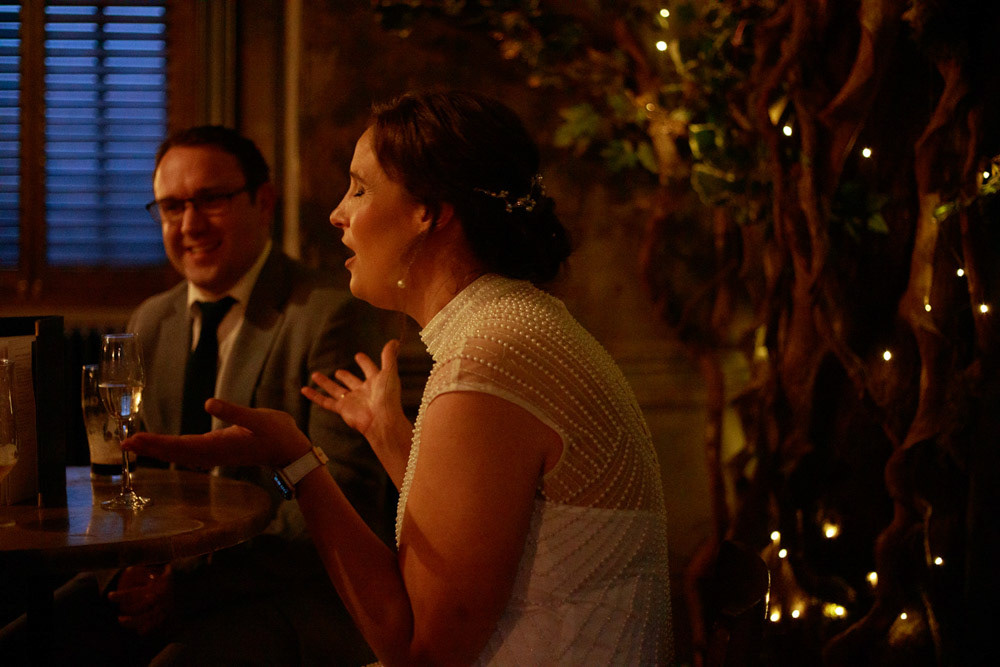 Gemma animated in conversation at the Lost & Found reception