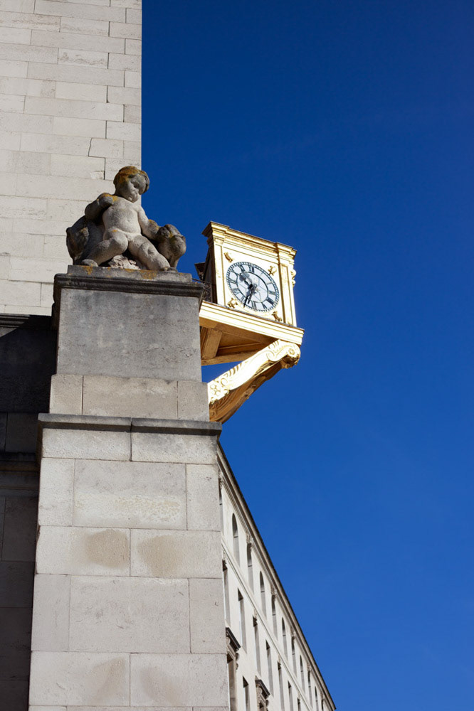 Clock details and blue skies at Cvic Hall Leeds