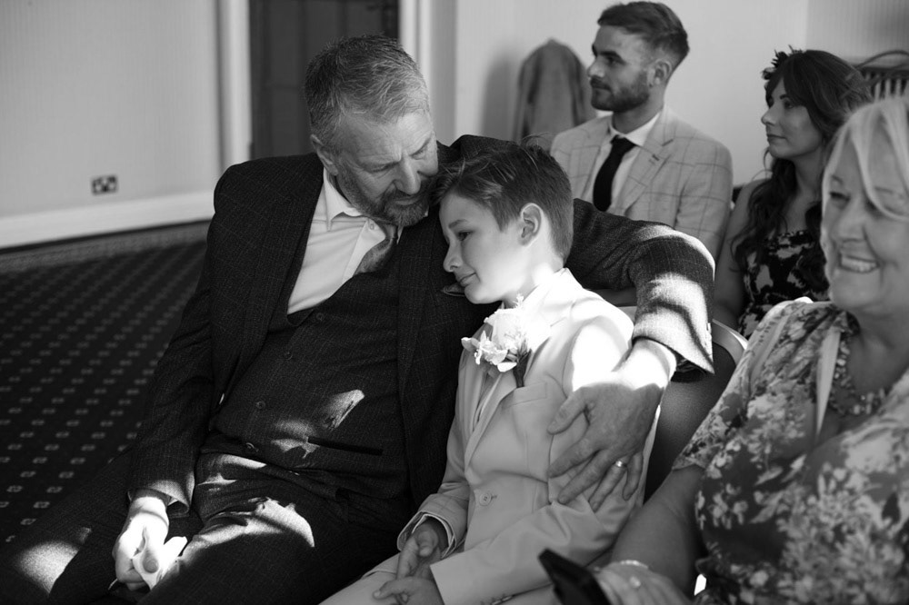 Groom’s emotional son comforted during ceremony at Civic Hall Leeds