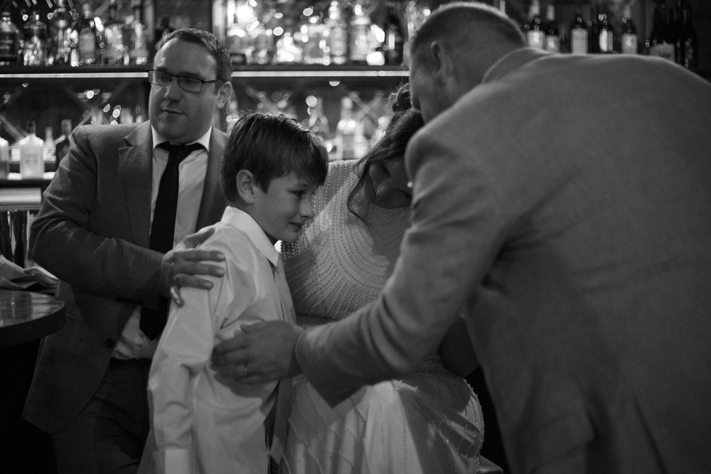 Groom’s son shares a moment of praise with his dad