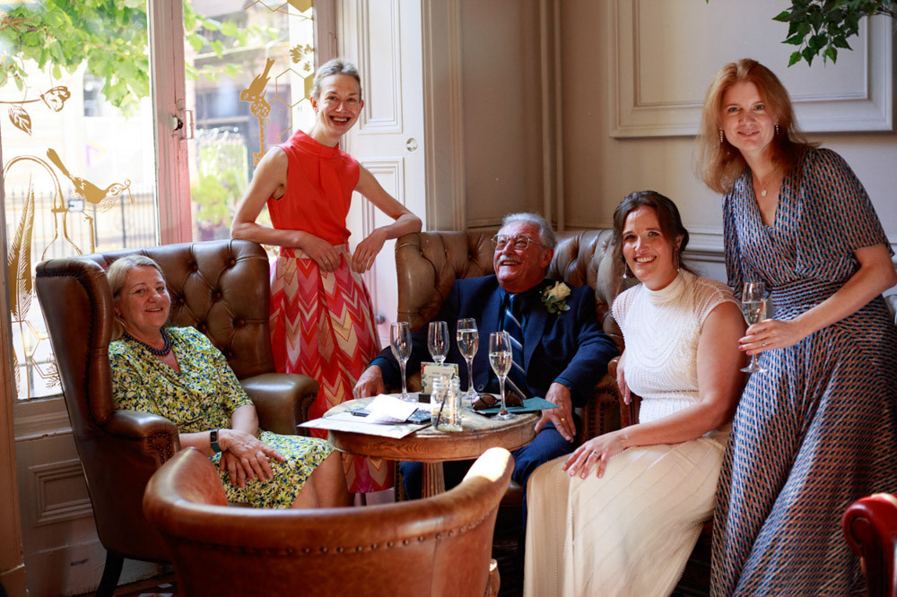 Bride sits with family and friends at Lost & Found Leeds