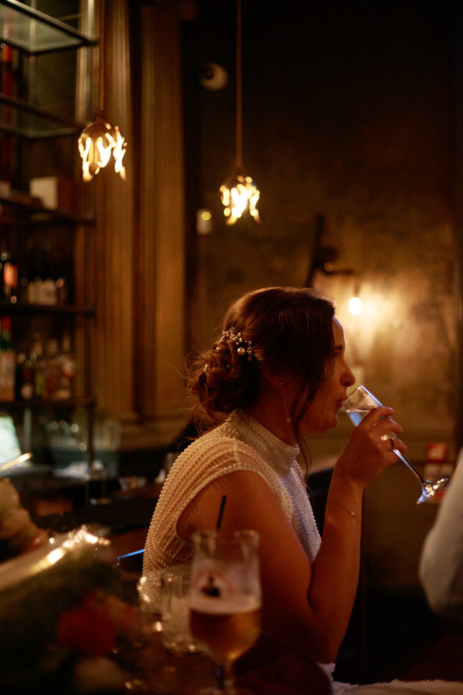 Gemma sips champagne at Lost & Found Leeds Club reception