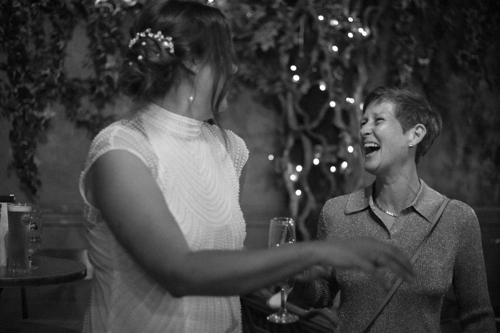 Gemma laughing with old friends