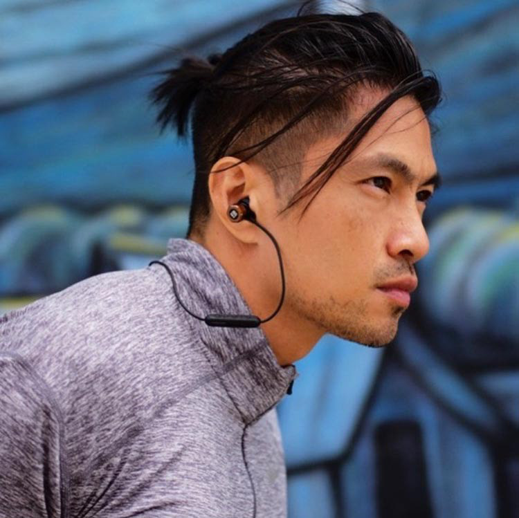 Earbolt featuring a photo of a model wearing the Earbolt