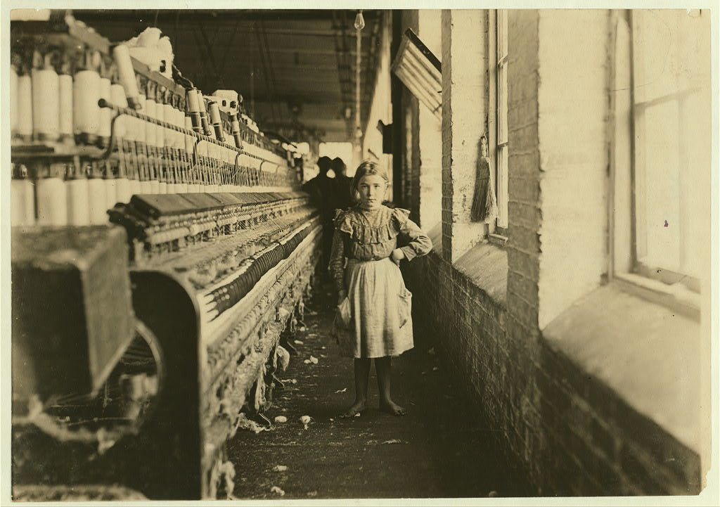 A little spinner in a Georgia Cotton Mill. Location: Georgia.