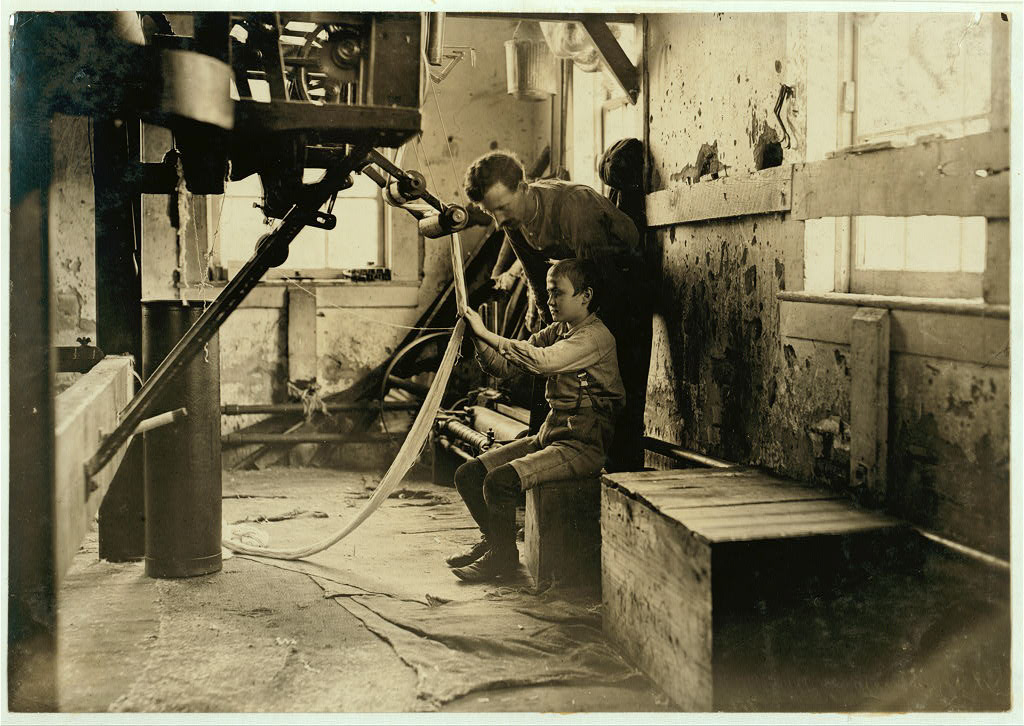 Newton Cotton Mill, Newton N.C. Boy at warping machine. Been there 2 years. Location: Newton, North Carolina.