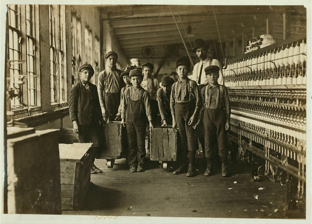Boy at warping machine. Been there 2 years. Clyde Cotton Mill. Location: Newton, North Carolina.