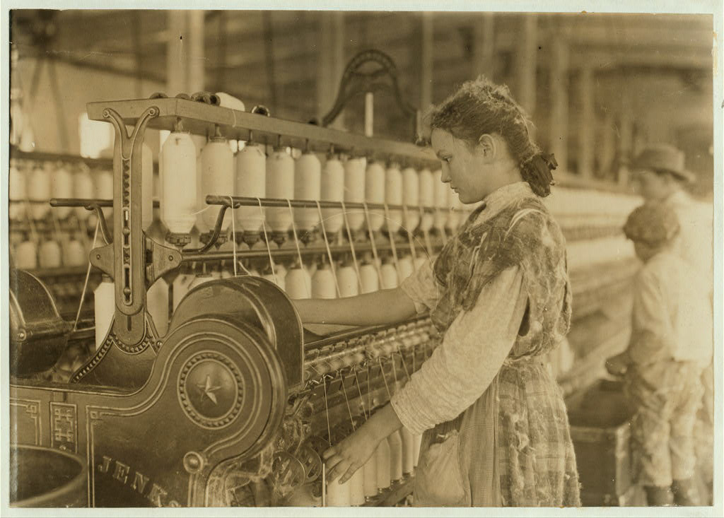 Spinner in Vivian Cotton Mills, Cherryville, N.C. Been at it 2 years. Where will her good looks be in ten years?. Location: Cherryville, North Carolina.