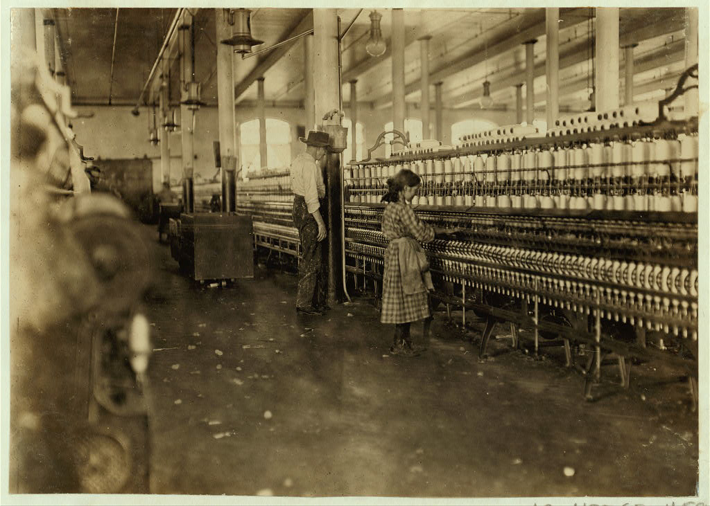 Spinner in Lancaster Cotton Mills, S.C. Many more as small as she. Location: Lancaster, South Carolina