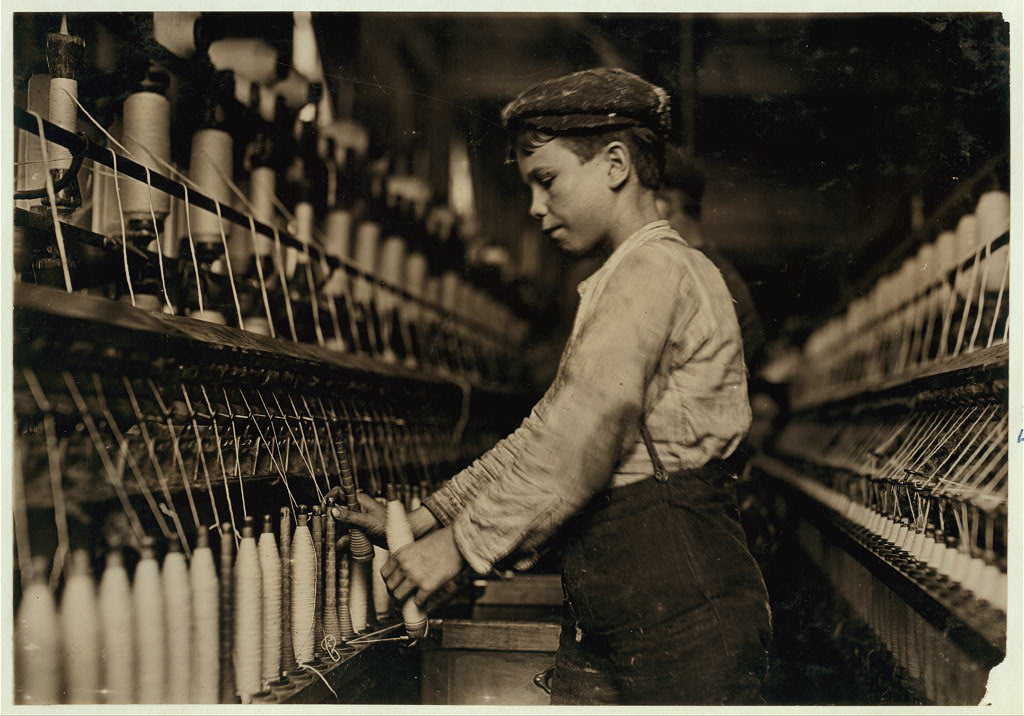 A doffer boy in Globe Cotton Mill, Augusta, Ga. Location: Augusta, Georgia.
