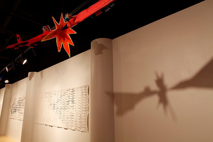 Using gallery lights to play with shadows on the walls of the crashing jet planes