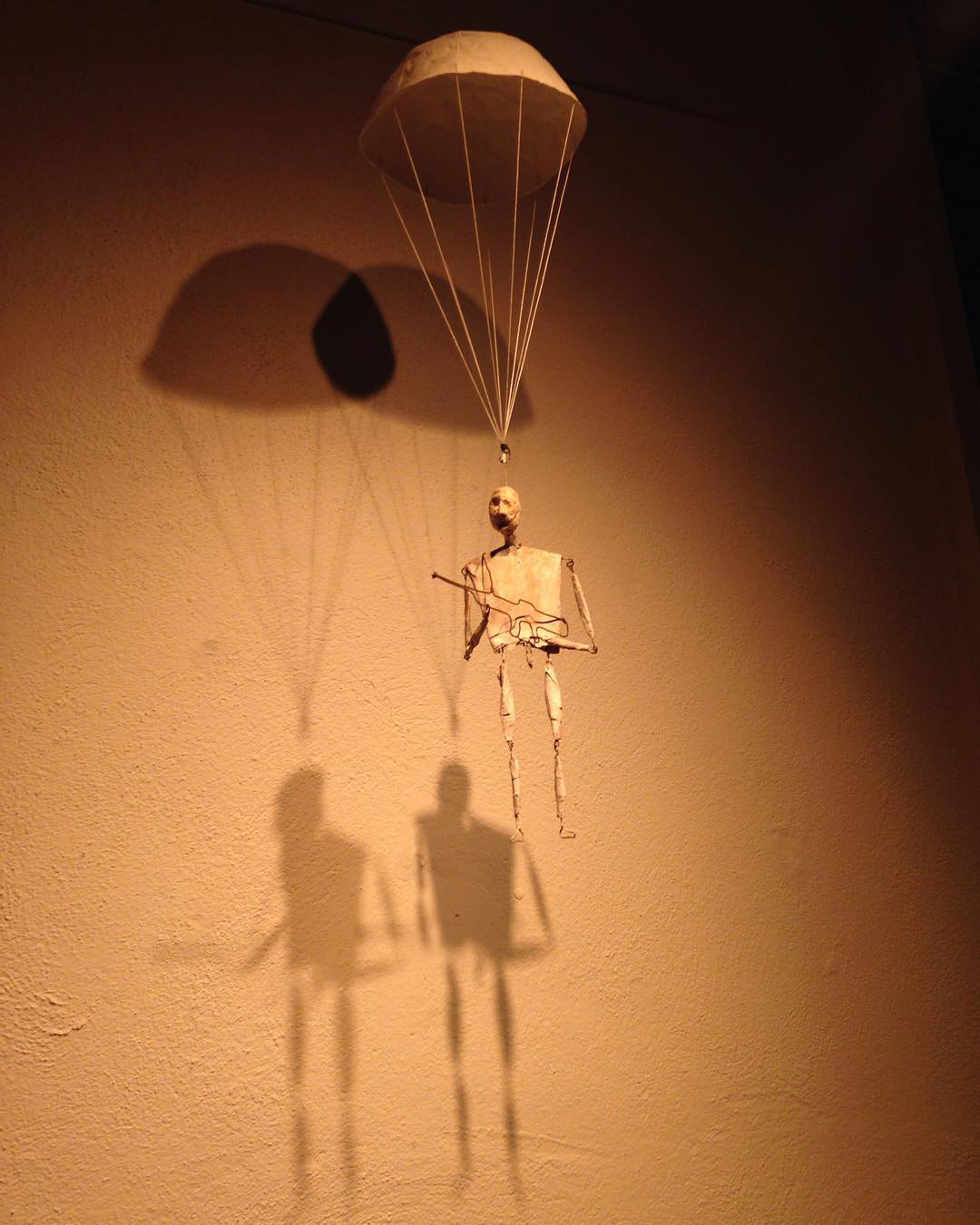 Paper-mache soldier on cloth-mache parachute