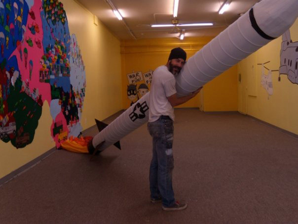Since the buildings were slated for demolition the artists had free reign inside the space. I repurposed the heating duct into a missile.