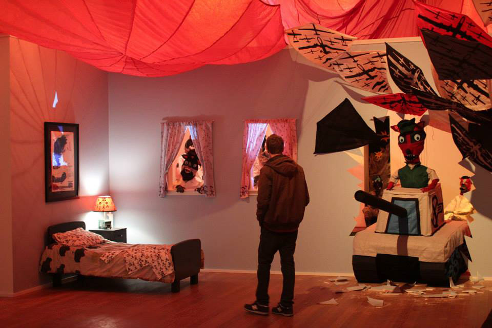 My idea was based off of the Kool-Aid Man busting through walls