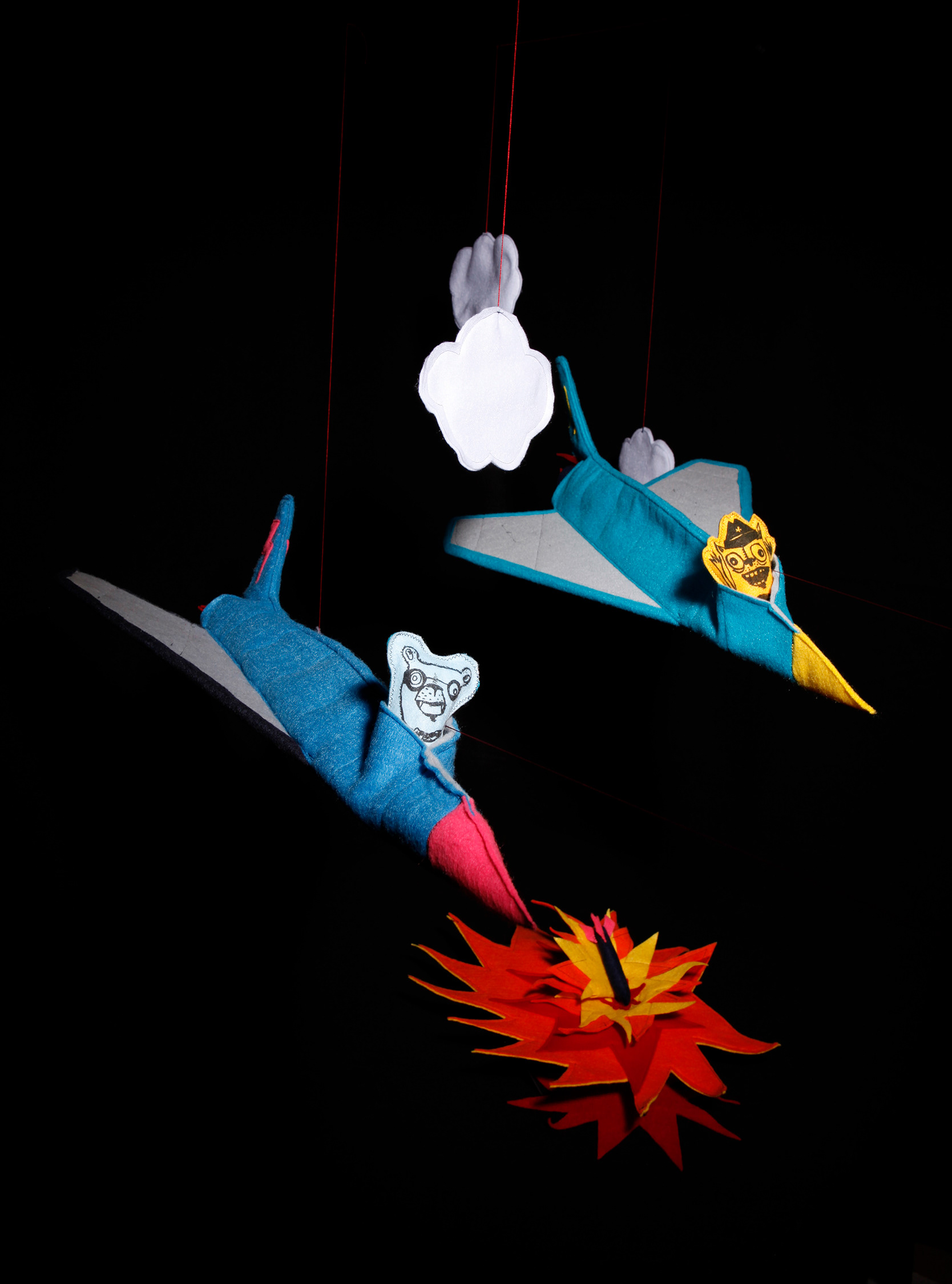 Detail of felt jet planes, hand sewn