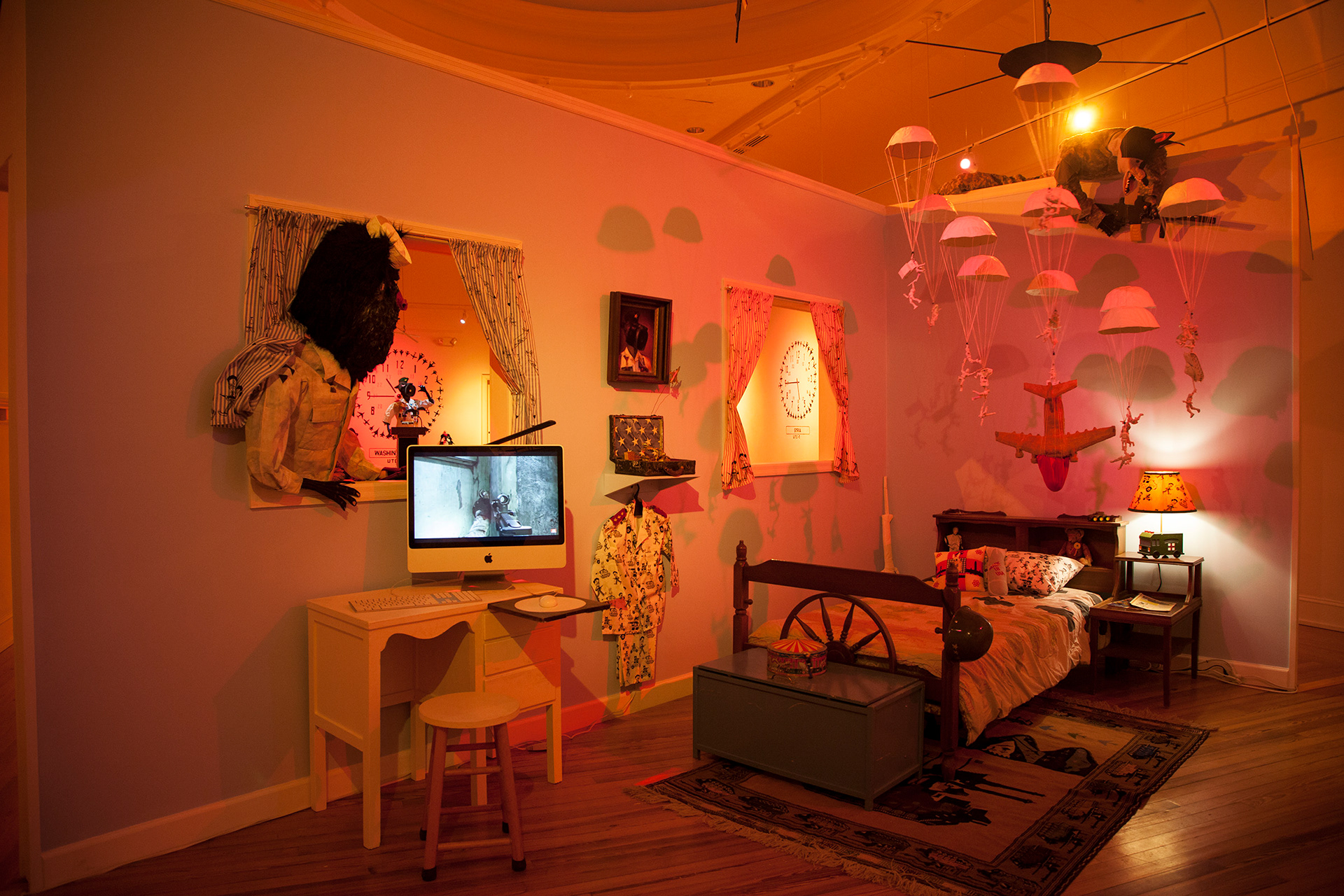 A boy's bedroom lies just inside the house. 