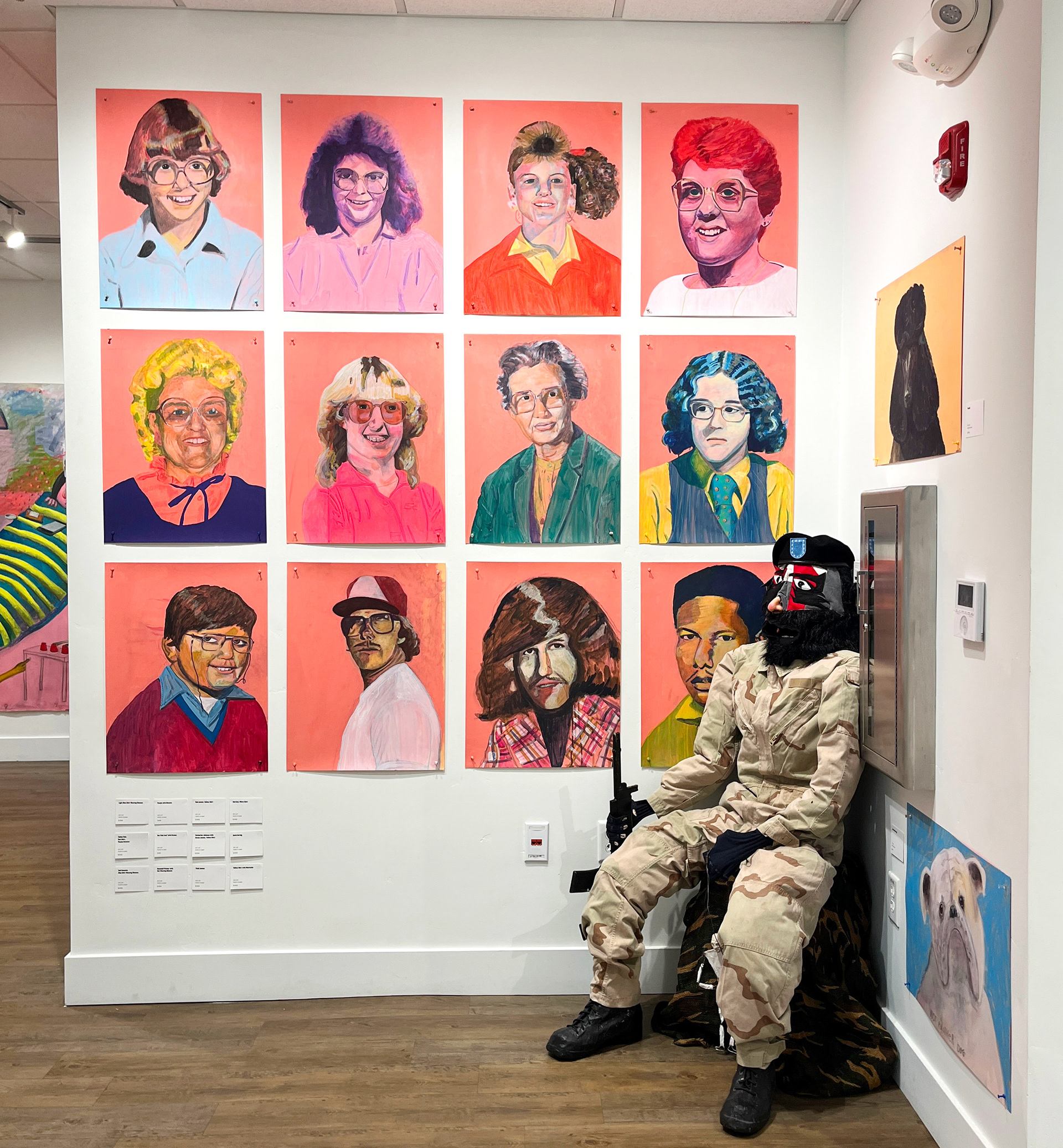 Portraits are Acrylic on Printmaking Paper, Soldier is wearing a uniform from Desert Storm, Head is sewn from civilian fabrics along with sewn articulating hands. Boots are cast papier-mache and acrylic with latex.