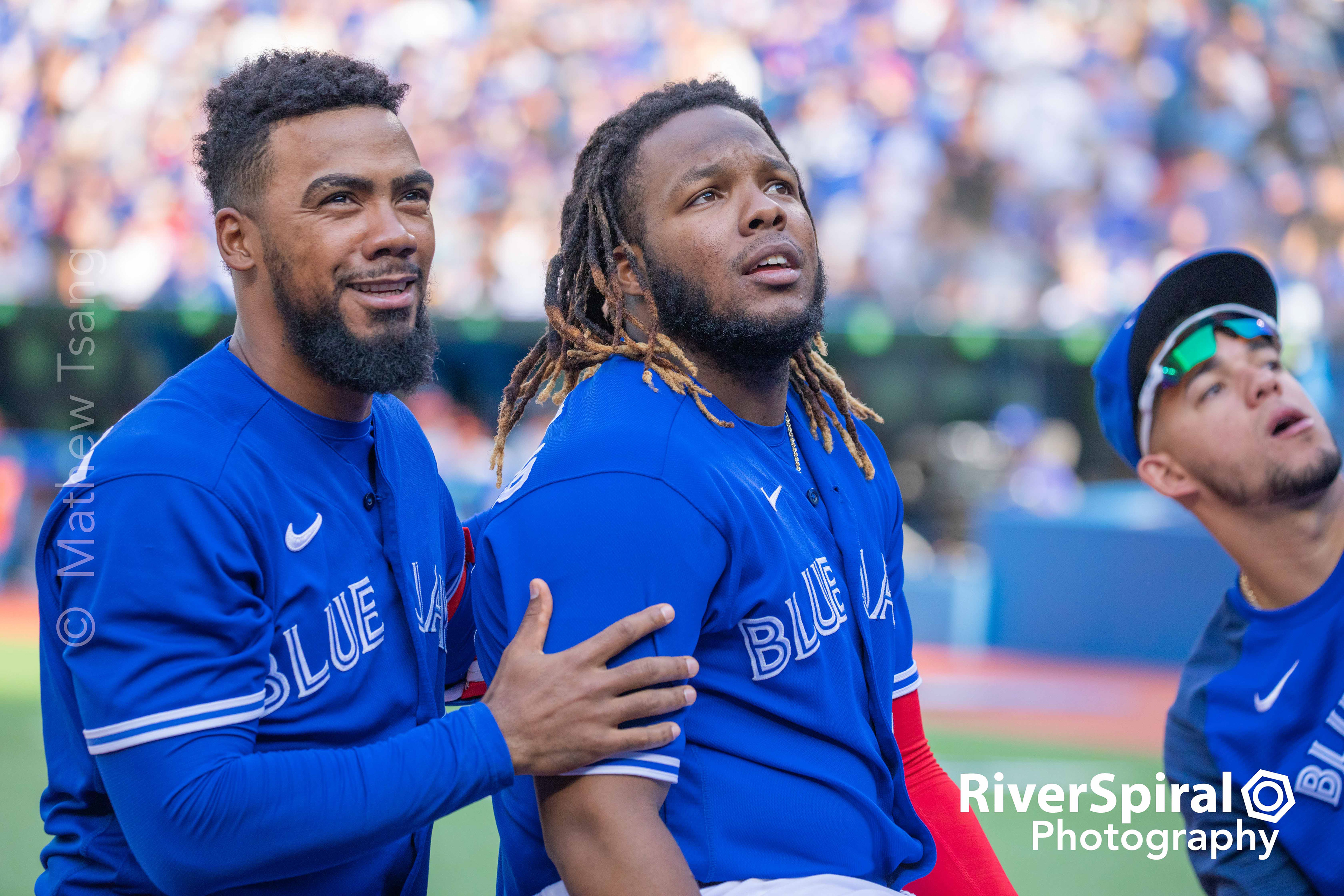 Toronto Blue Jays left fielder Teoscar Hernandez (37) and first baseman Vladimir Guerrero Jr. (27) observe fans in the 500 section. The Blue Jays defeat the Baltimore Orioles 10-1 in Toronto. Saturday, Oct. 2, 2021