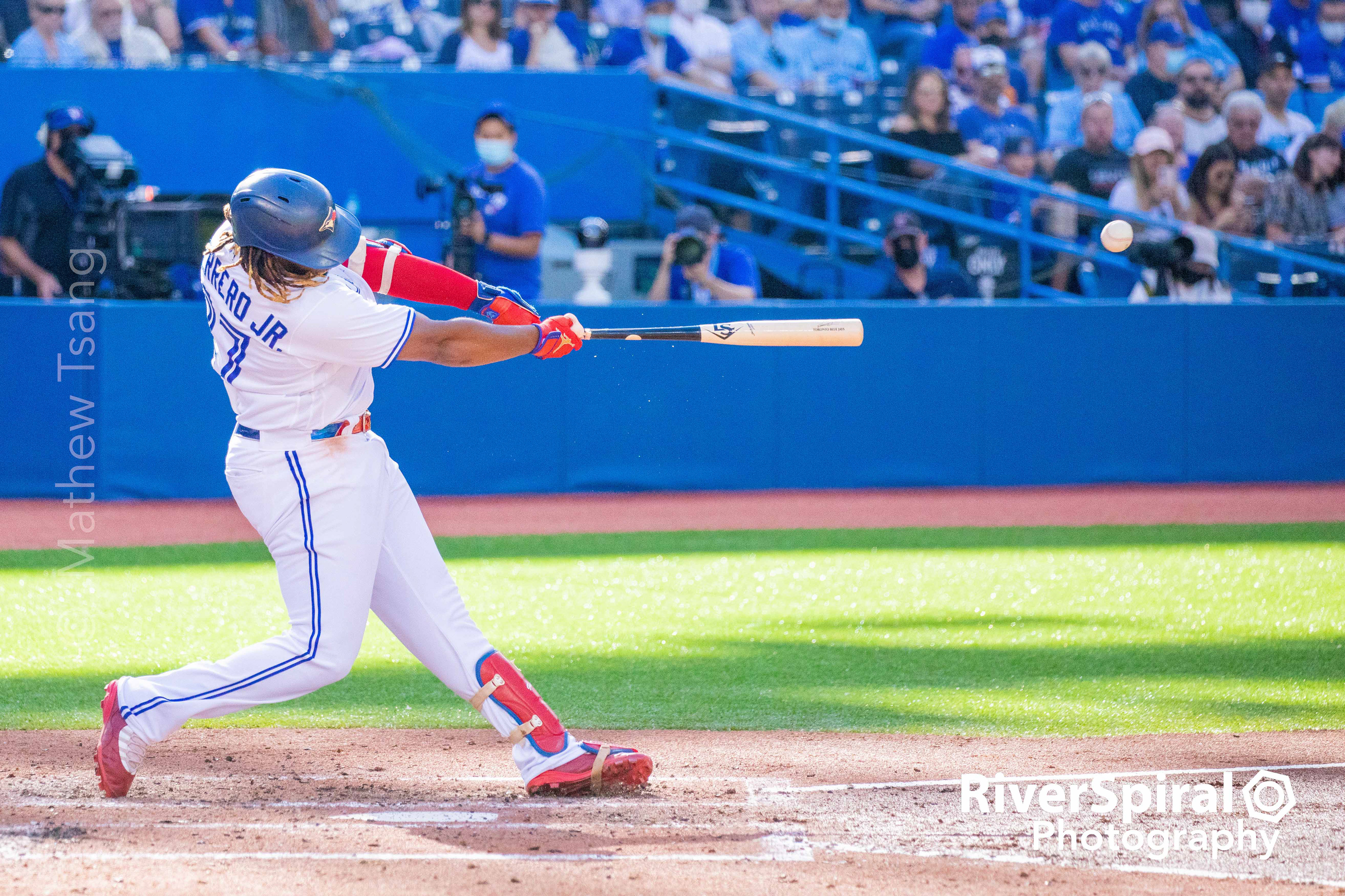 Vladimir Guerrero Jr. (27) makes contact.