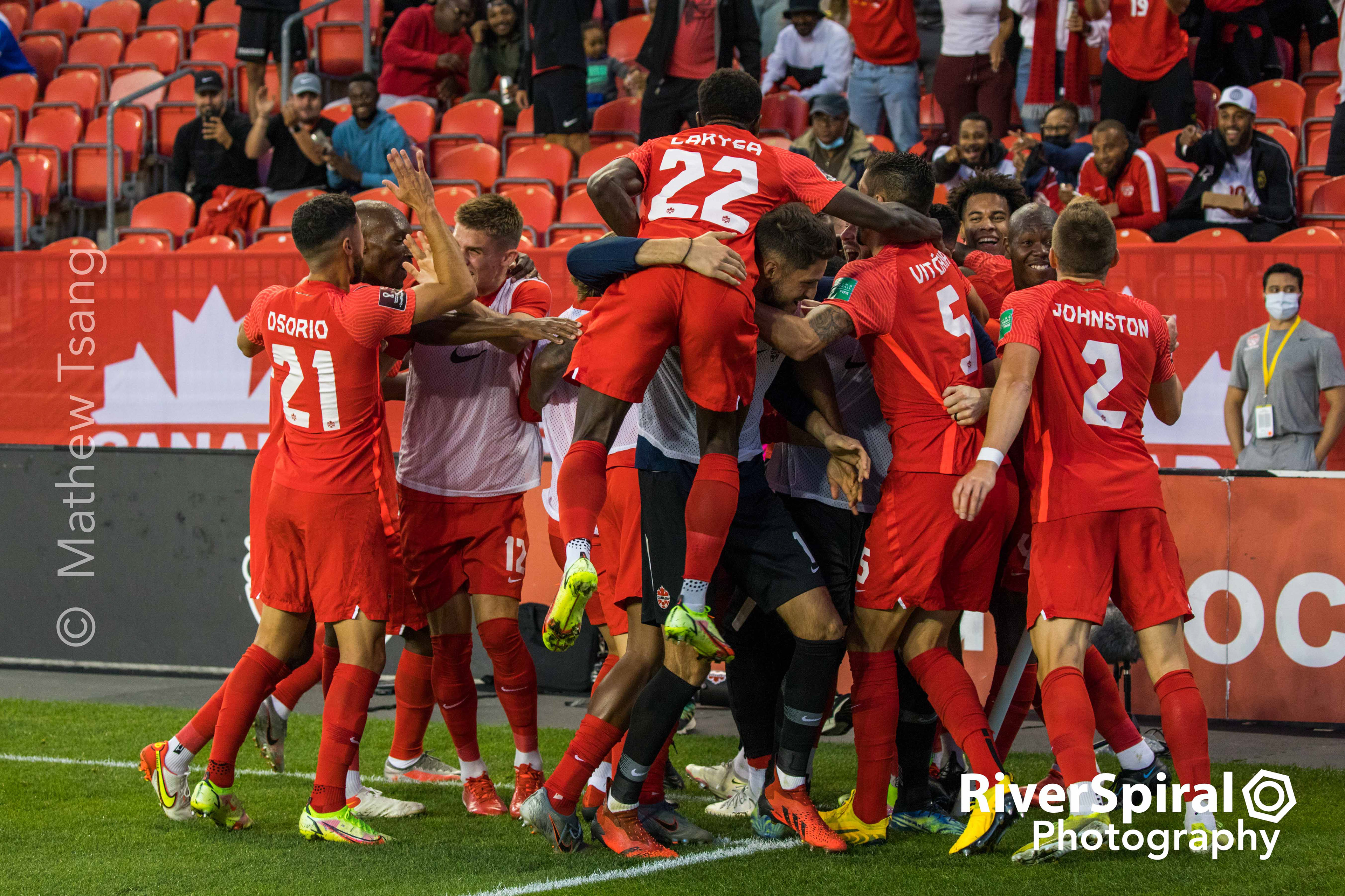 Team Canada celebrates a goal.