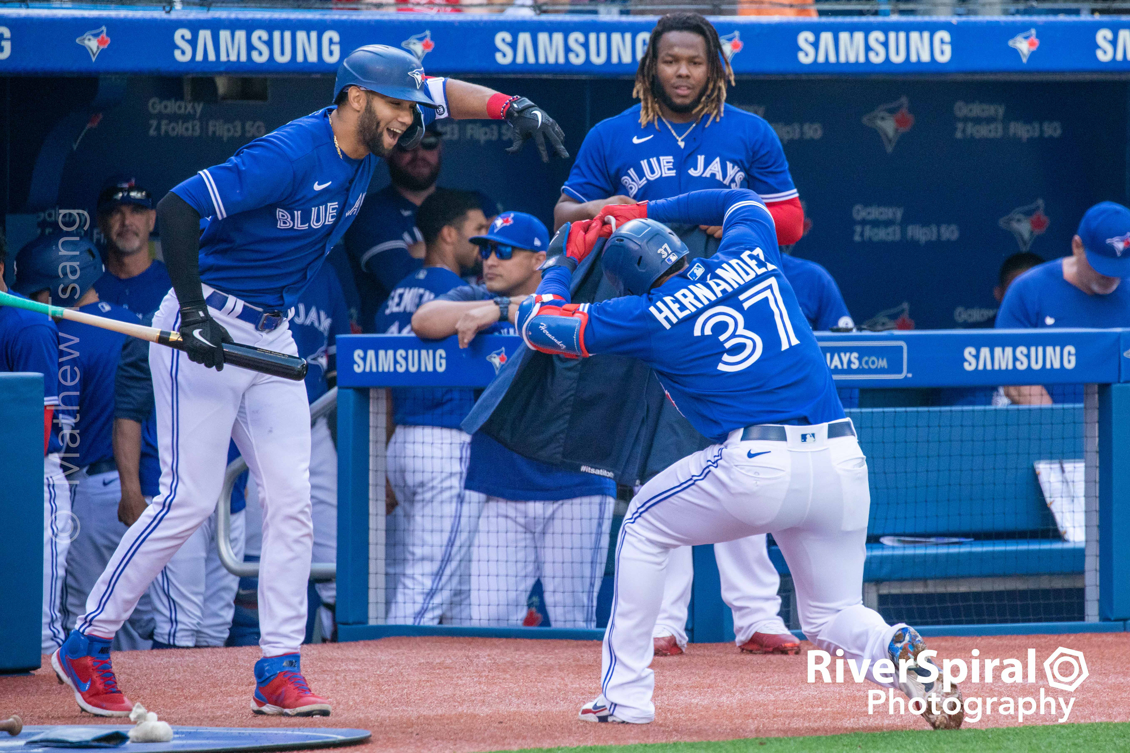 Teoscar Hernandez (37) returns to the dugout for his Blue Jacket.